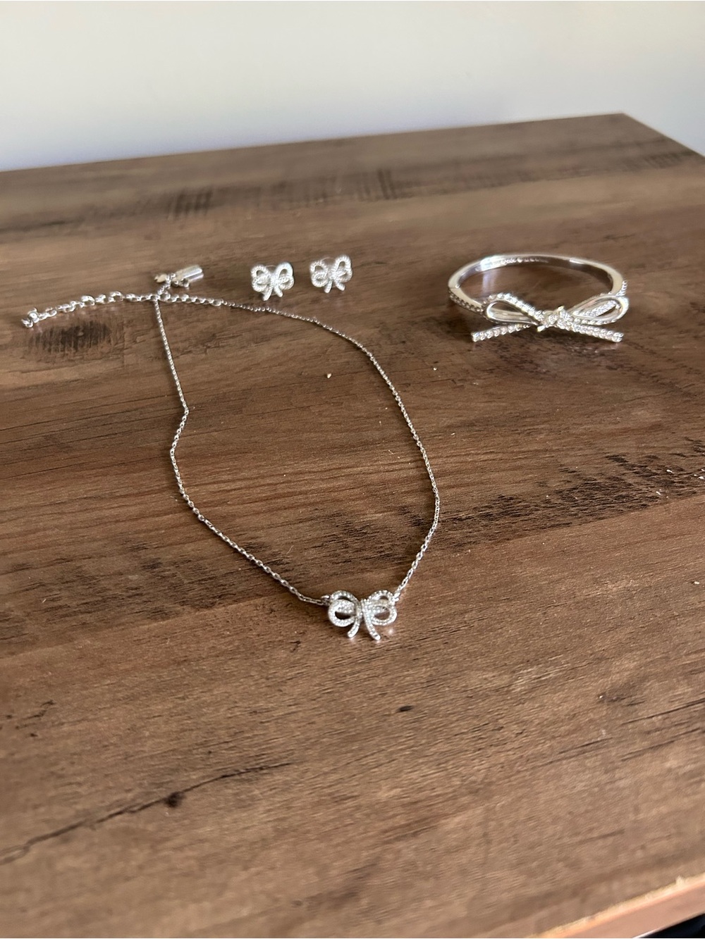 Kate Spade Silver Bow Necklace with Matching Bow Studs and Ring